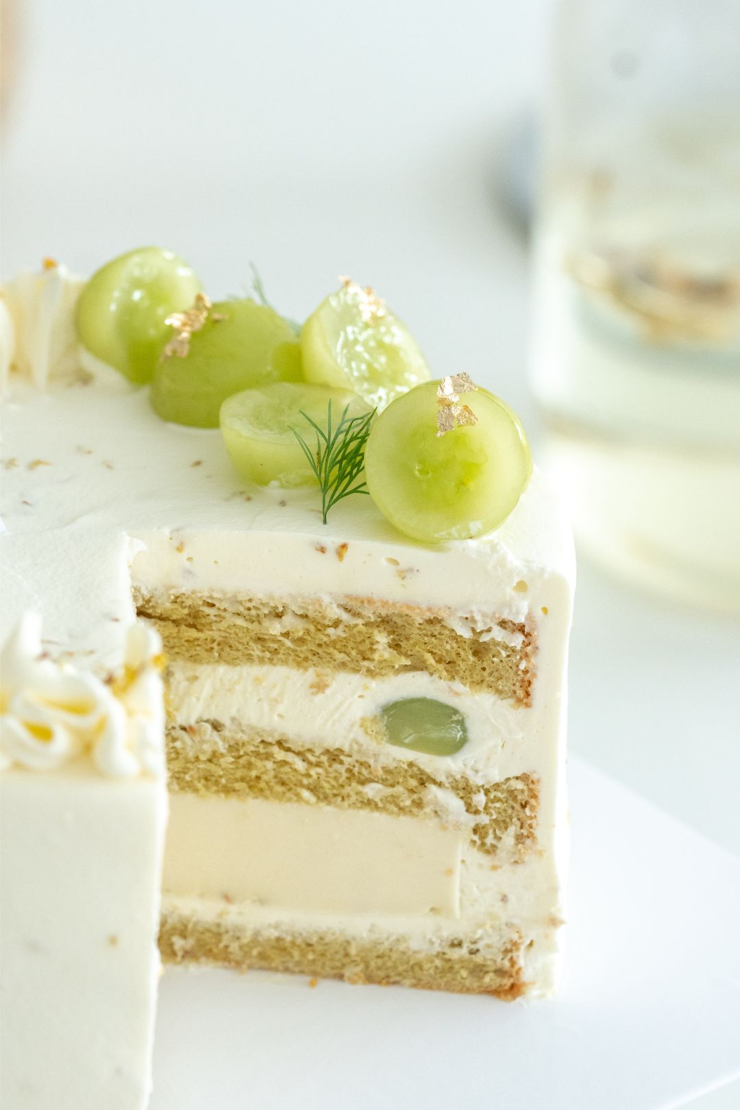 Nice sponge happy birthday cake with mascarpone and grapes on the cake  stand on festive light bokeh Stock Photo - Alamy